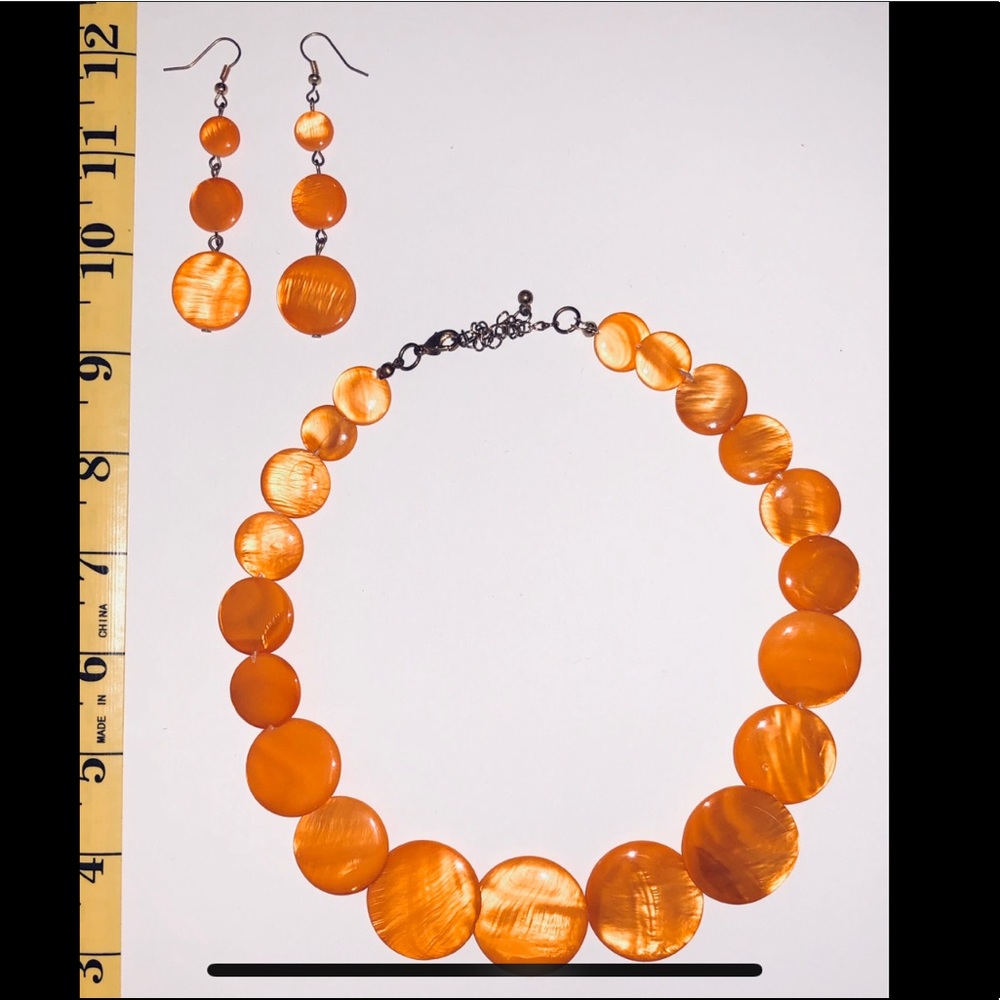 Gently used necklace and earring set.